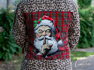 Believe Santa Patch on an Animal Print Flannel