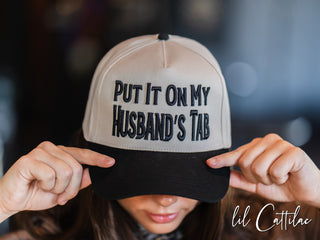 Put it on My Husband's Tab Trucker Caps